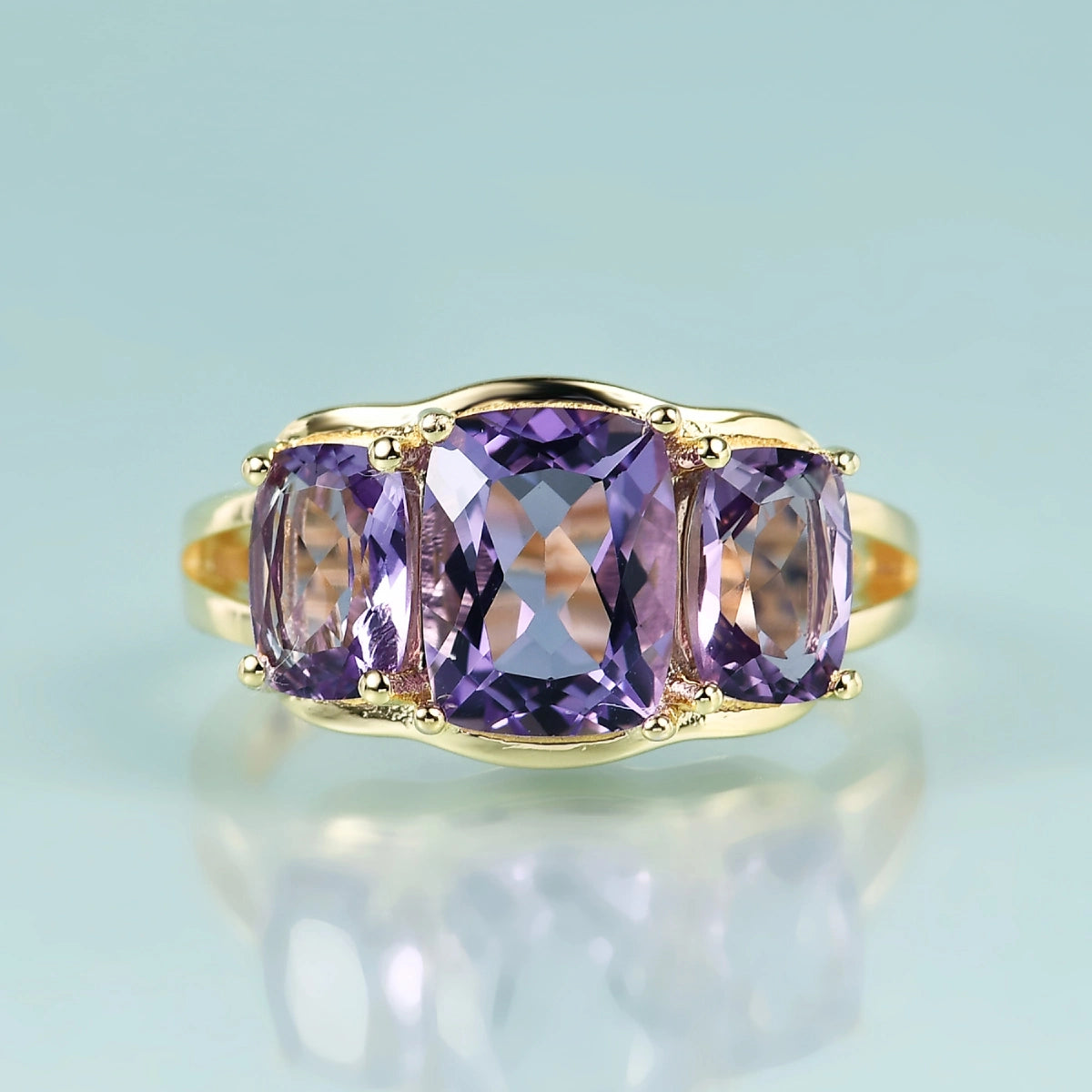 Three-stone trellis amethyst ring