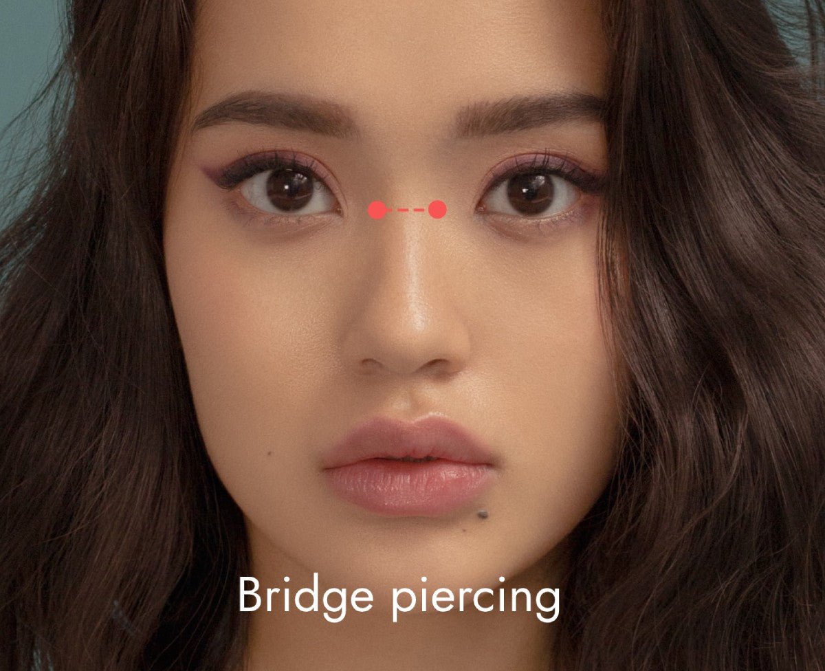 What is a bridge piercing? Costs, healing, pain, aftercare, jewelry...