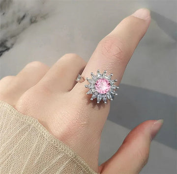 Diamond spinner ring with a pink charm large diamond gold silver sterling silver anxiety ring