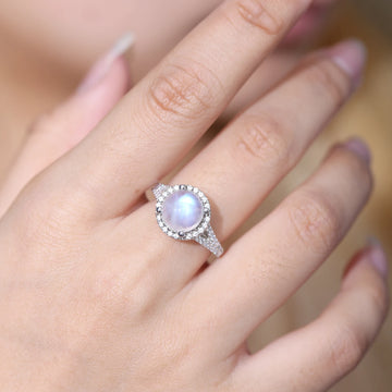 Large moonstone ring with a round moonstone and cz stones