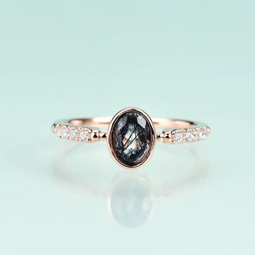 Rutile quartz engagement ring oval cut bezel set dainty and simple