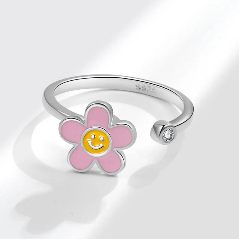 Spinning flower ring anxiety ring for daughter for kids a pink flower and a smiley face cute fidget ring Rosery Poetry