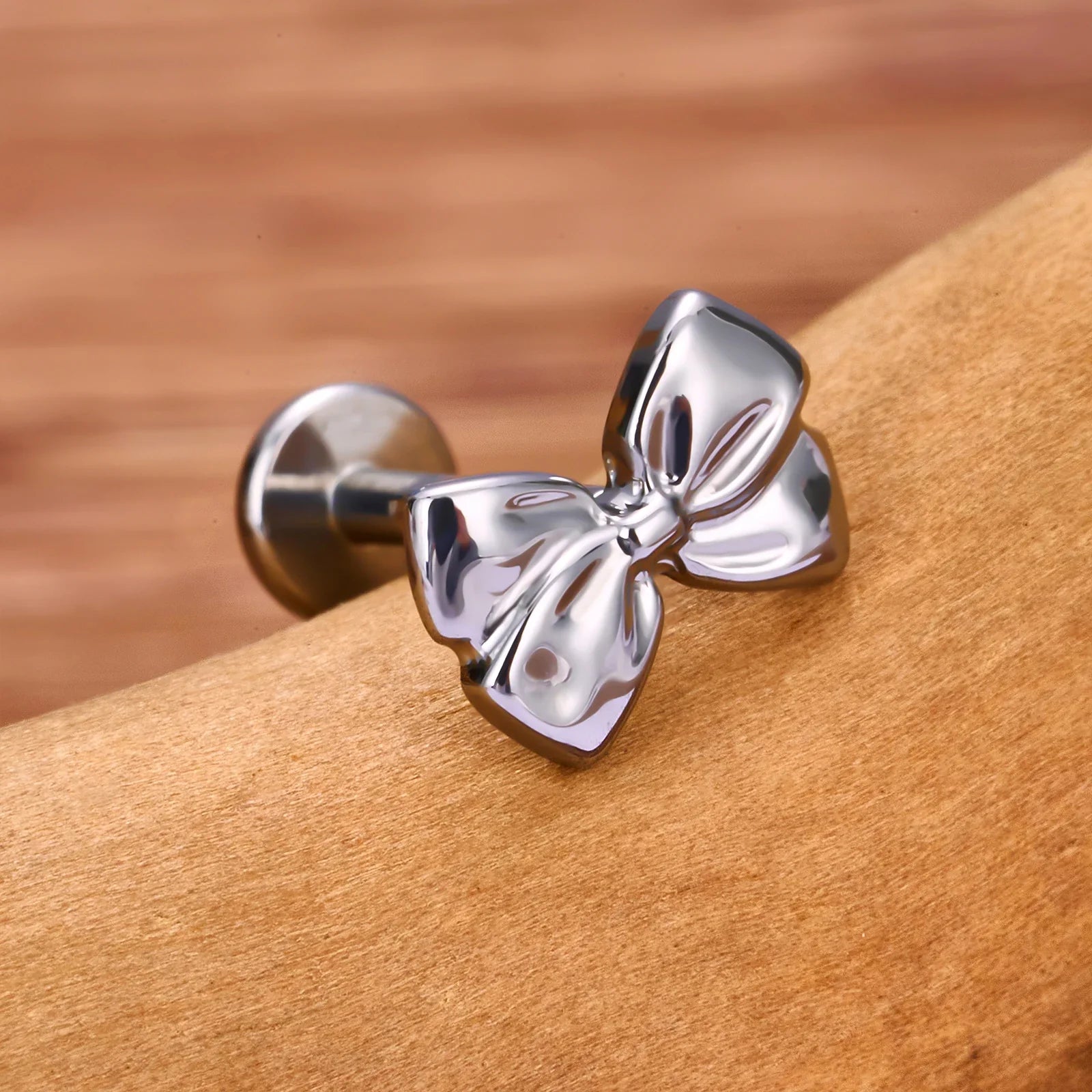 Bow stud earring in gold and silver cute and pretty titanium nose stud