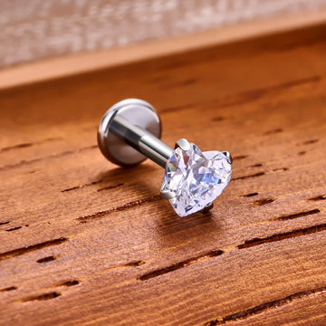Labret/helix/tragus piercing in chirurgisch staal met een ronde kristal Labret/helix/tragus piercing in chirurgisch staal met een ronde kristal