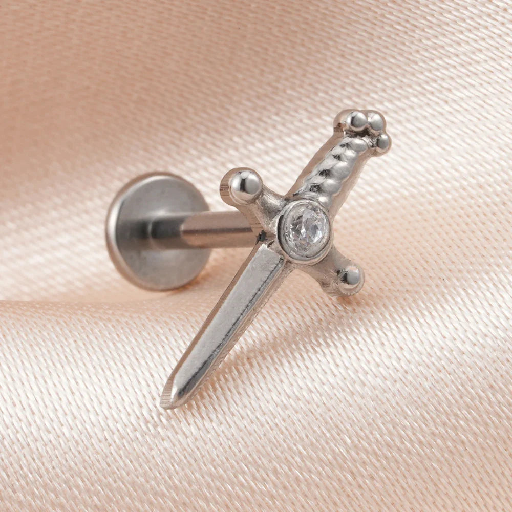 Dagger earring stud with a cz stone titanium gold and silver labret piercing 16G internally threaded sword ear stud Ashley Piercing Jewelry