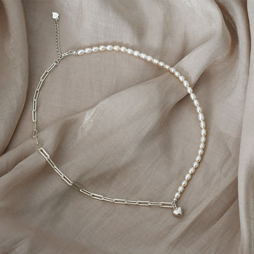 Pearl necklace with a sweet heart pendant