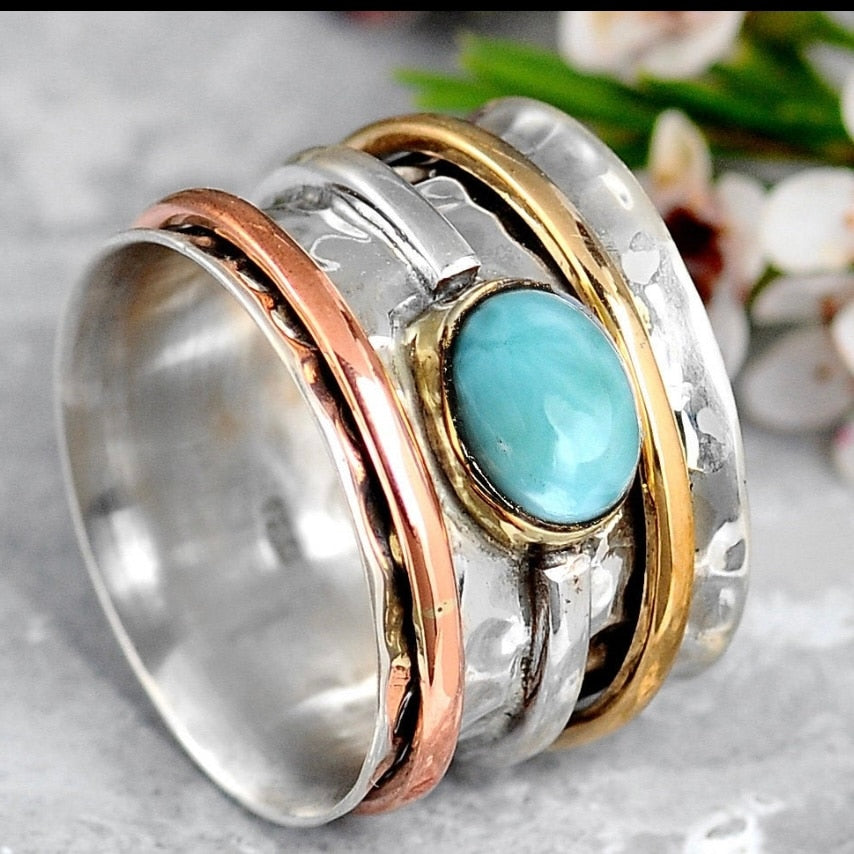 Luxe fidget ring wide band with a green turquoise stone Rosery Poetry