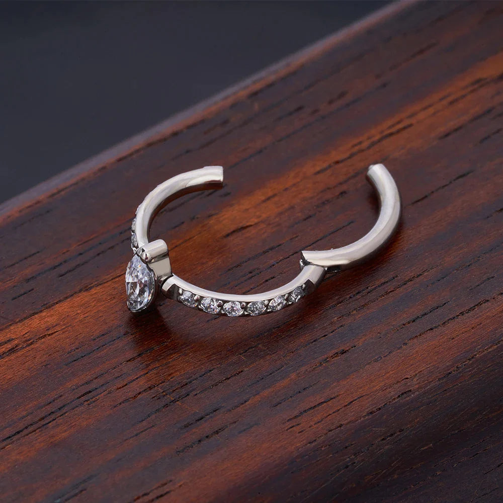 Snug piercing ring 16G titanium with marquise CZ stones hinged segment clicker Ashley Piercing Jewelry