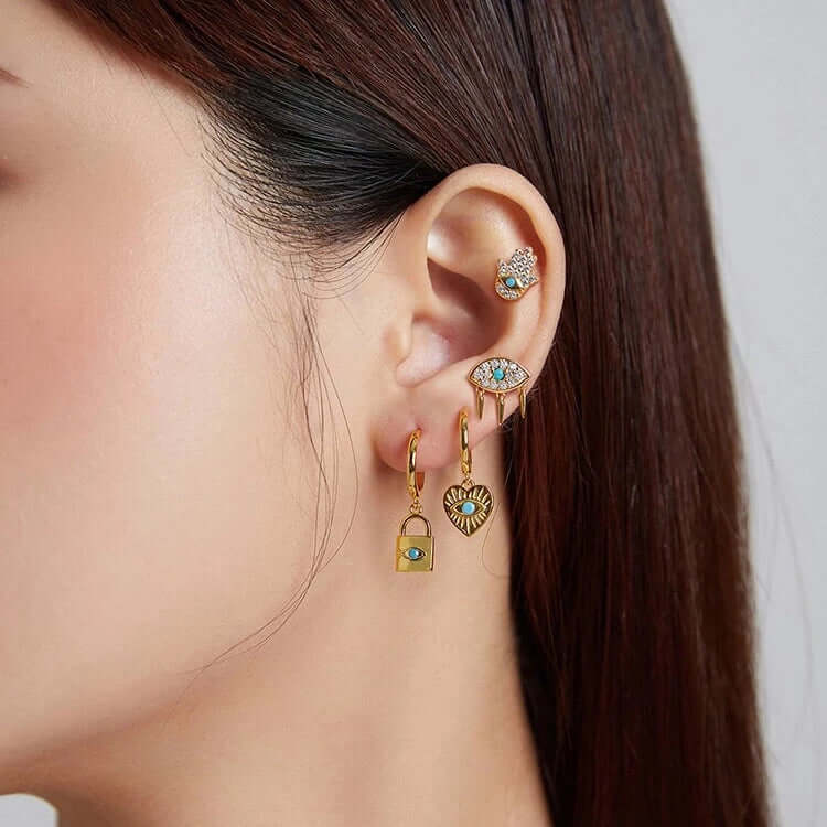 Evil eye and heart earring thejoue