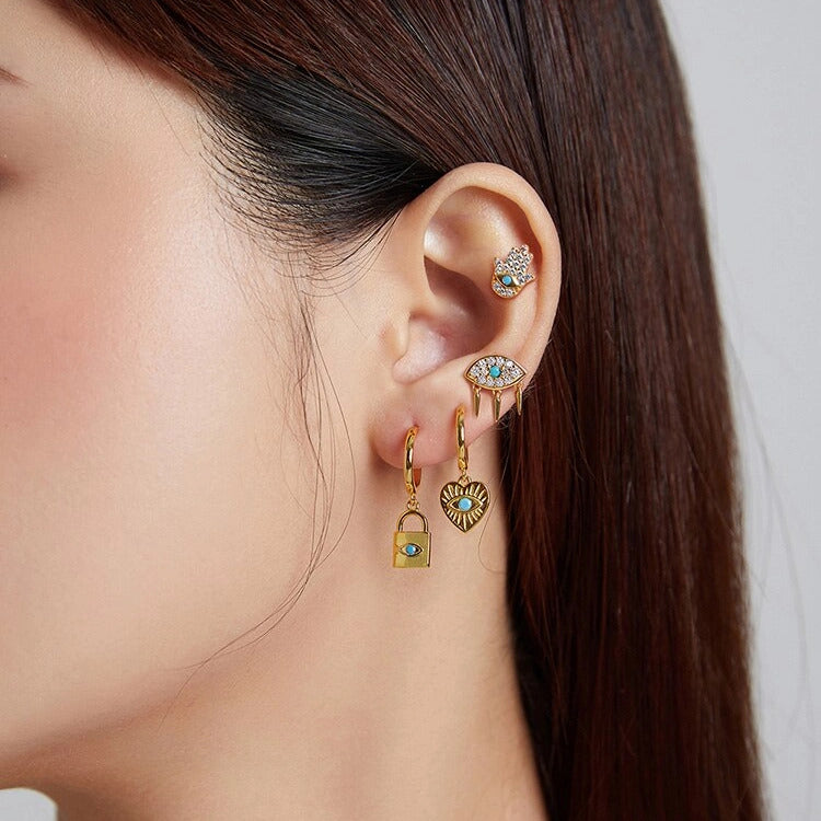 Evil eye and lock earring thejoue