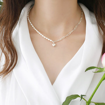 Pearl necklace with a sweet heart pendant